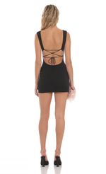 Picture Open Back Bodycon Dress in Black. Source: https://media-img.lucyinthesky.com/data/Mar24/150xAUTO/b71df004-ba69-477b-82e3-779af5b94687.jpg