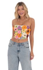 Picture 3-D Flower Strapless Top in Black. Source: https://media-img.lucyinthesky.com/data/Mar24/150xAUTO/ceacd71b-90fa-4645-9d60-0a6a531cfe50.jpg