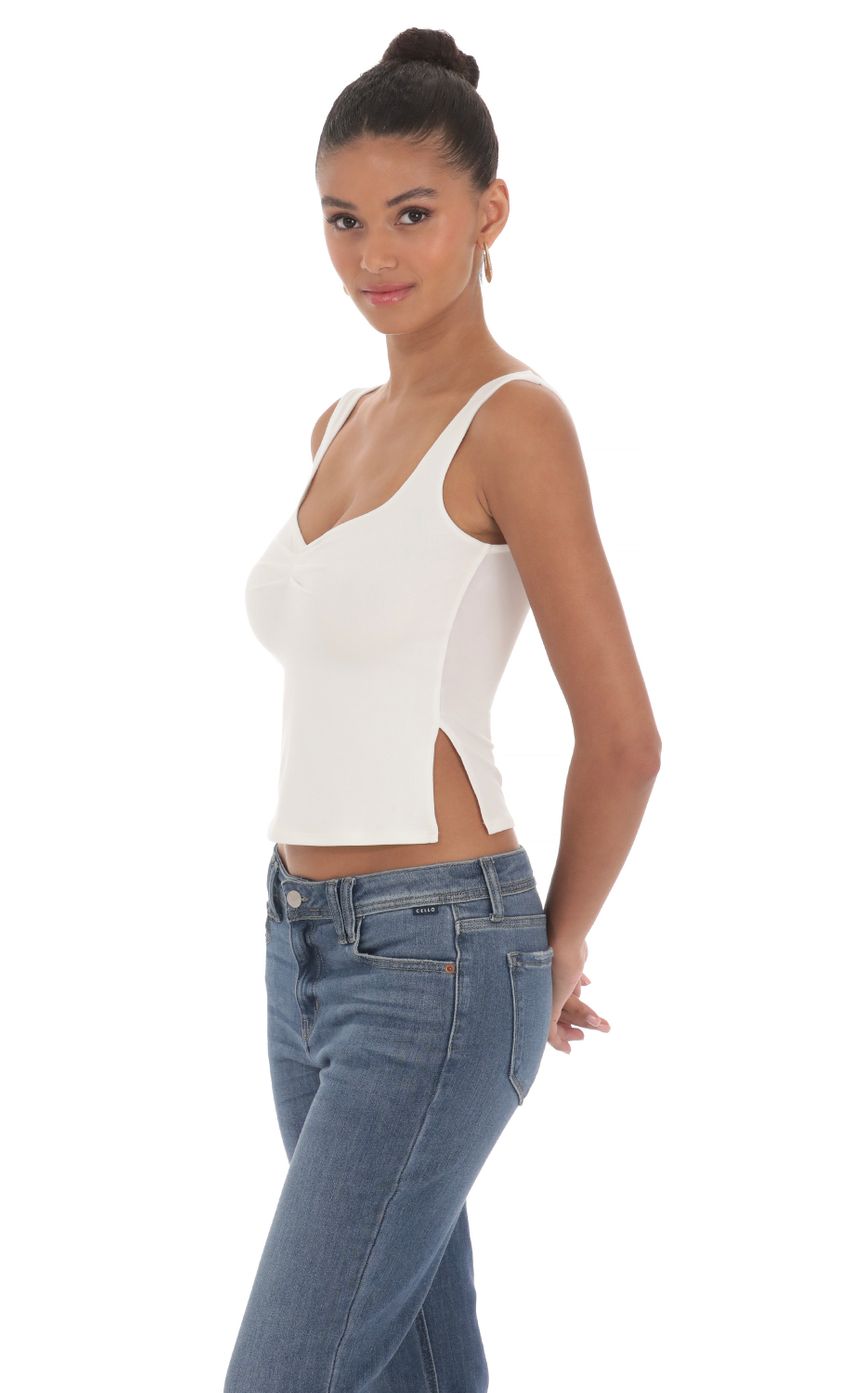 Picture Side Slit Top in White. Source: https://media-img.lucyinthesky.com/data/Mar24/850xAUTO/01c95c79-1297-438f-8c1a-a7dbe354fcbd.jpg