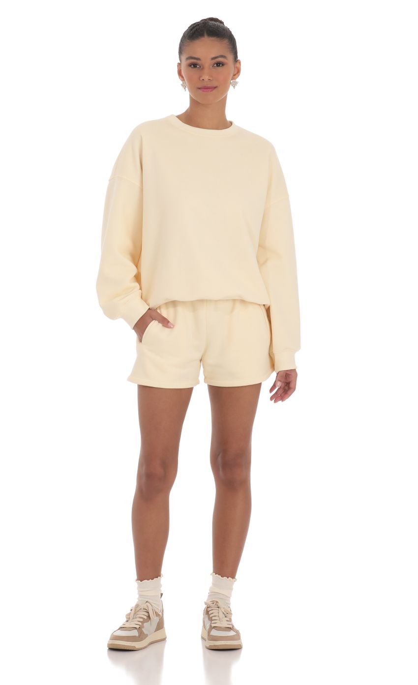 Picture Fleece Sweat Shorts in Cream. Source: https://media-img.lucyinthesky.com/data/Mar24/850xAUTO/02fc026e-e800-41c7-addd-bfb62d4f4c52.jpg