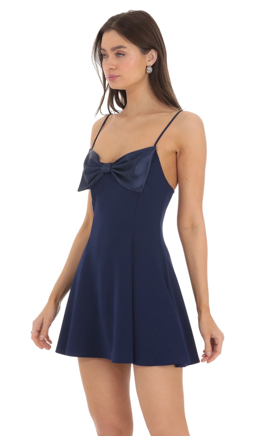 Picture Front Bow A-line Dress in Navy. Source: https://media-img.lucyinthesky.com/data/Mar24/850xAUTO/060faf76-6de5-4cae-ba1a-4204ea50146a.jpg