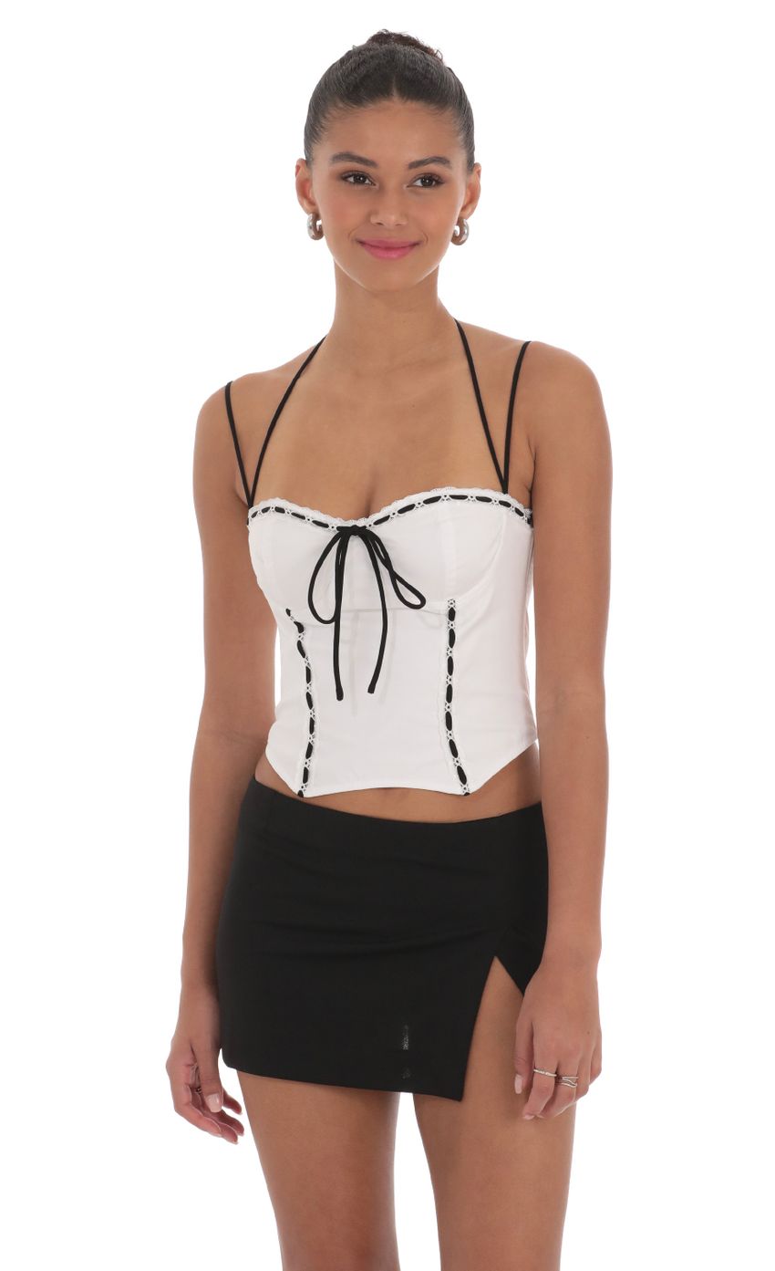 Picture Lace Halter Top in White. Source: https://media-img.lucyinthesky.com/data/Mar24/850xAUTO/0bf35320-268a-44f5-a892-f7700b244b74.jpg