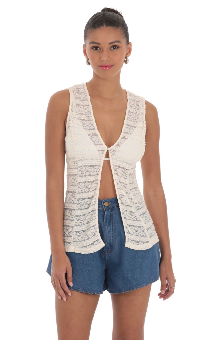 Picture Lace Vest in Cream. Source: https://media-img.lucyinthesky.com/data/Mar24/850xAUTO/0c06281d-0410-434a-8a9a-a5cdf641311d.jpg