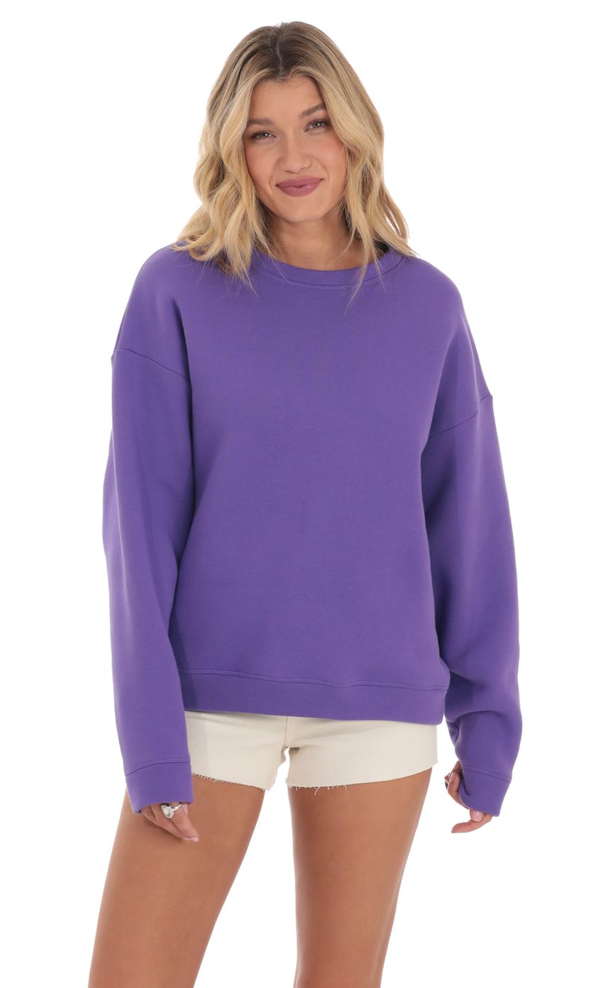 Picture Oversized Jumper in Purple. Source: https://media-img.lucyinthesky.com/data/Mar24/850xAUTO/1268933e-5473-4308-a32c-8b3a8f684f43.jpg