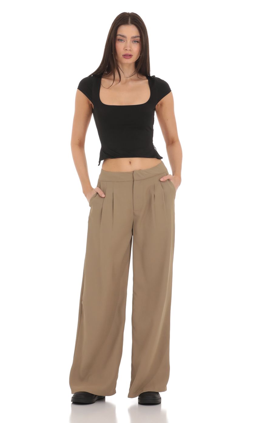 Picture Pleated Wide Leg Trousers in Taupe. Source: https://media-img.lucyinthesky.com/data/Mar24/850xAUTO/1a4218d2-f970-411b-ad51-a3d53fbade80.jpg