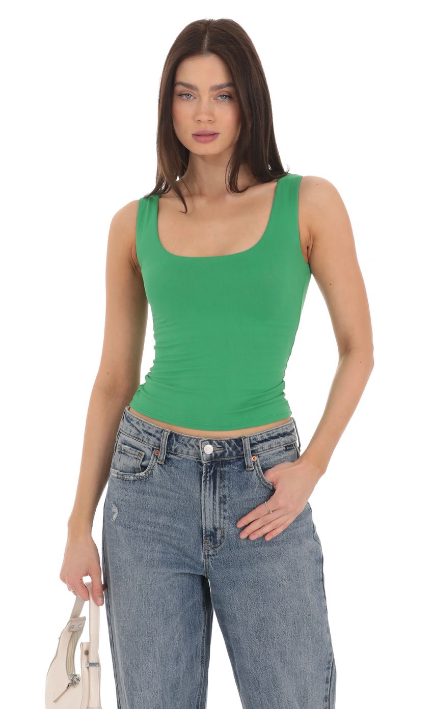 Picture Scoop Neck Tank Top in Green. Source: https://media-img.lucyinthesky.com/data/Mar24/850xAUTO/1c59f1b6-4d1f-438d-babc-233b0c91953c.jpg