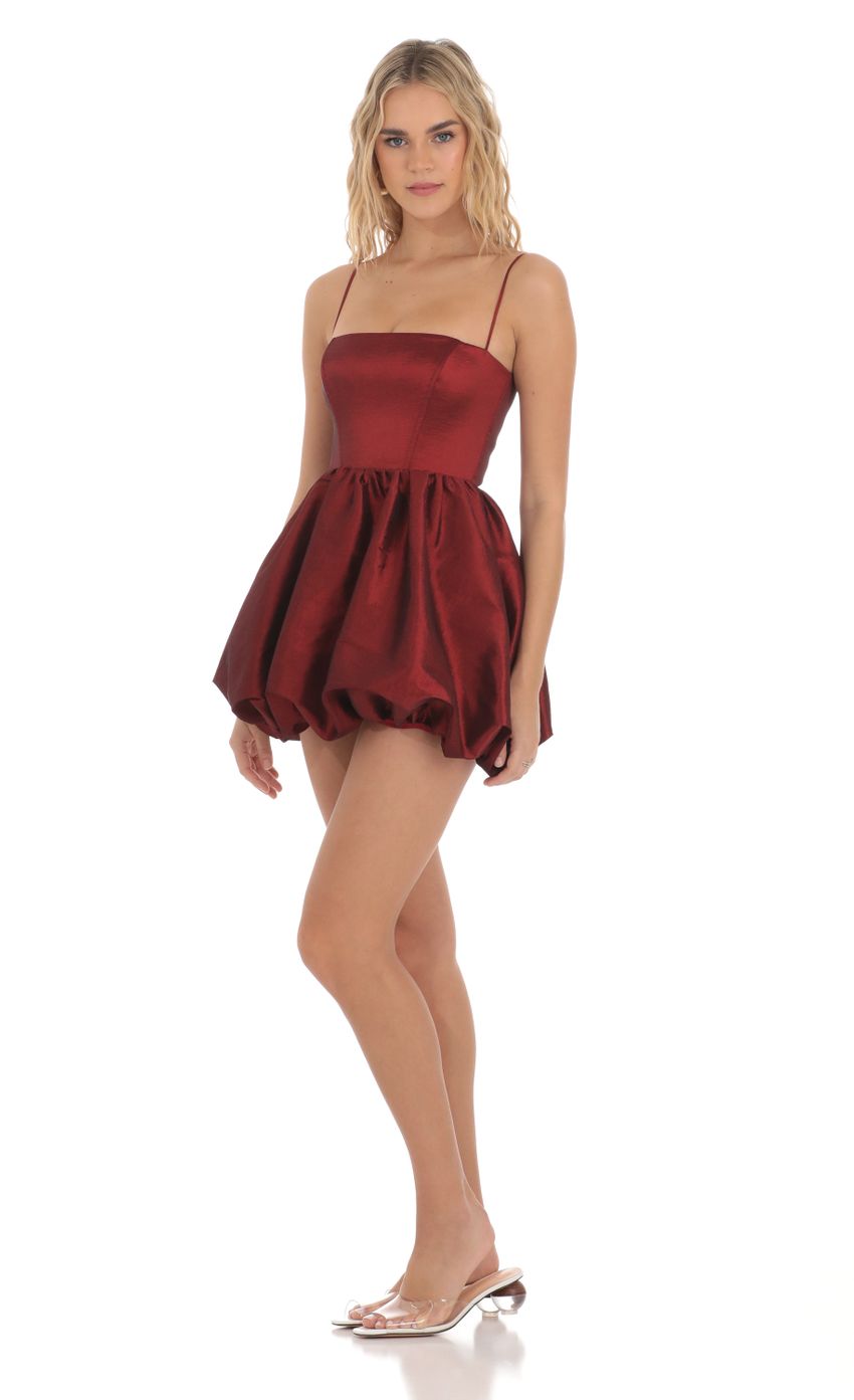 Picture Bubble Skirt Dress in Deep Red. Source: https://media-img.lucyinthesky.com/data/Mar24/850xAUTO/1c8a71a6-7921-44d7-a565-b3868361ad2d.jpg