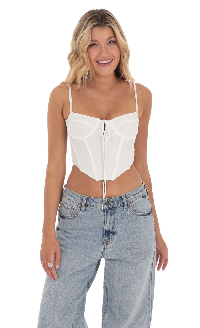 Picture Mesh Front Tie Corset Top in White. Source: https://media-img.lucyinthesky.com/data/Mar24/850xAUTO/1d59342e-117f-4175-b5ee-3fdbd3888a84.jpg