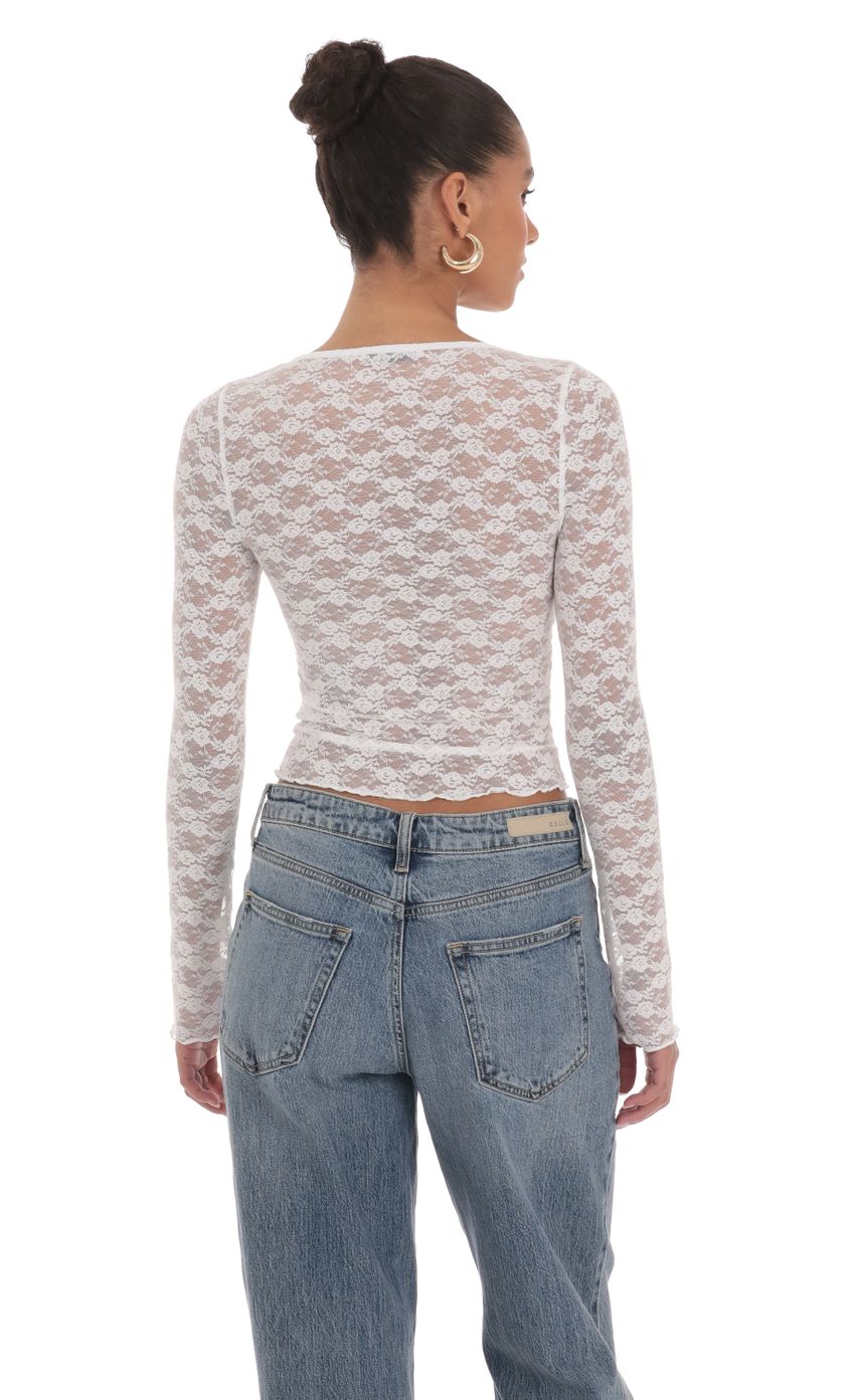 Picture Long Sleeve Lace Top in White. Source: https://media-img.lucyinthesky.com/data/Mar24/850xAUTO/1d5f6b5e-4dd9-4d91-a6ba-bacd6bf0cbc0.jpg