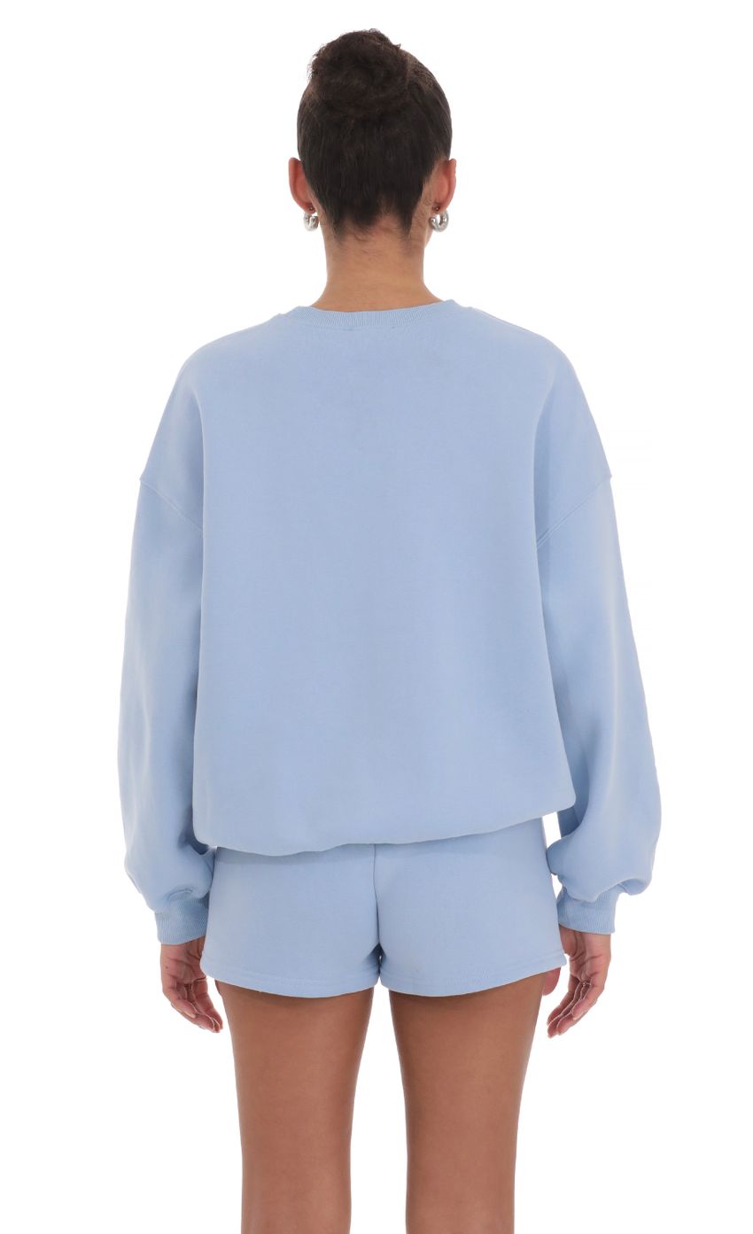 Picture Fleece Jumper in Light Blue. Source: https://media-img.lucyinthesky.com/data/Mar24/850xAUTO/1efa794c-3c7a-43f3-bfe0-1a6987a7ad34.jpg