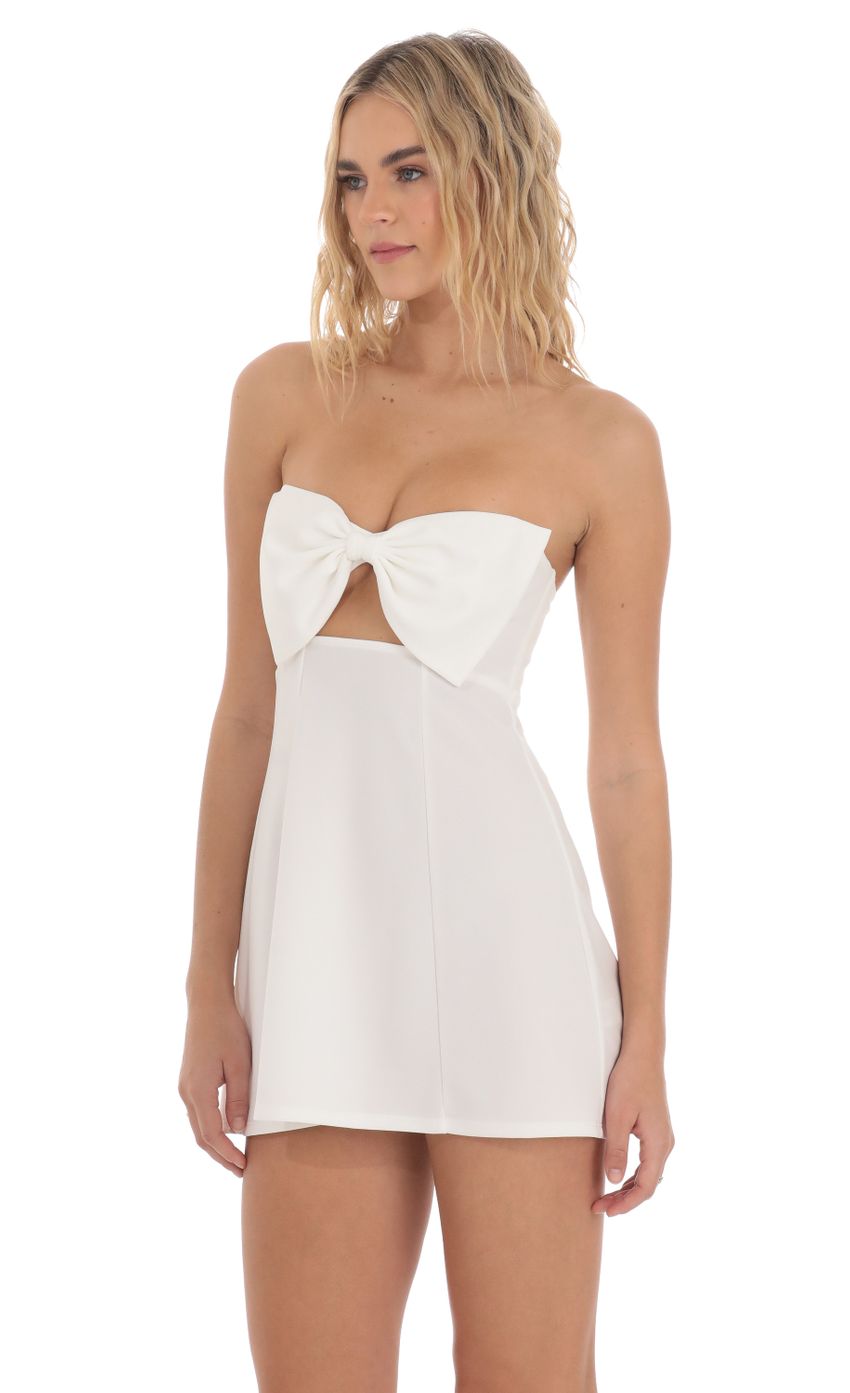 Picture Bow Cutout Strapless Dress in White. Source: https://media-img.lucyinthesky.com/data/Mar24/850xAUTO/1fee8bd9-26dd-45a3-8956-57b8a8a512e1.jpg
