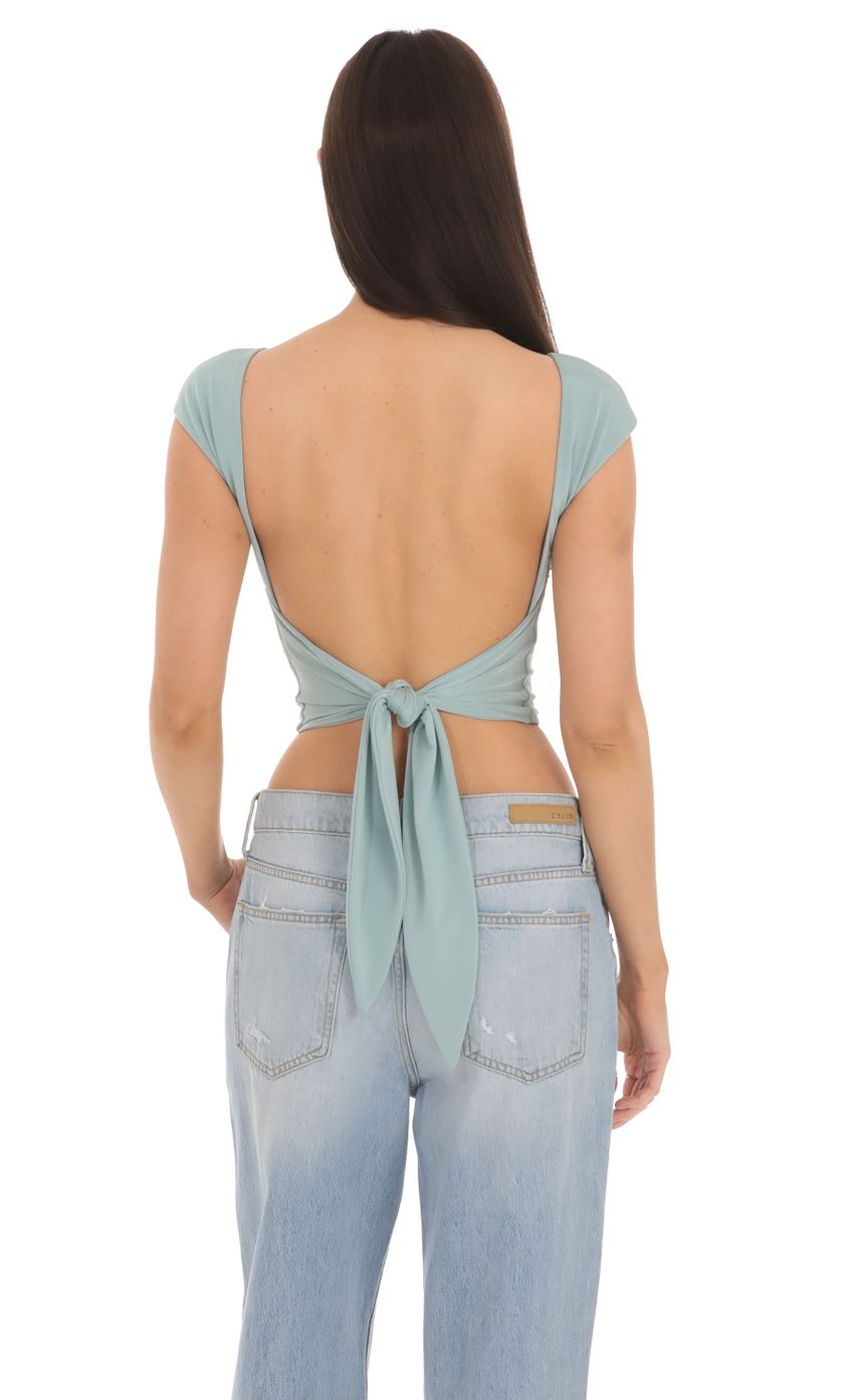Picture Open Tie Back Top in Seafoam Blue. Source: https://media-img.lucyinthesky.com/data/Mar24/850xAUTO/22c99e80-a90c-4959-a6d7-bf75c8411246.jpg