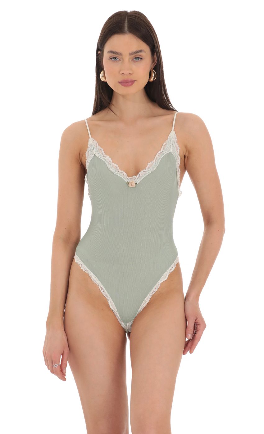 Picture Ribbed Lace Bodysuit in Sage Green. Source: https://media-img.lucyinthesky.com/data/Mar24/850xAUTO/26a21603-b861-491b-ab20-819e1fa52756.jpg