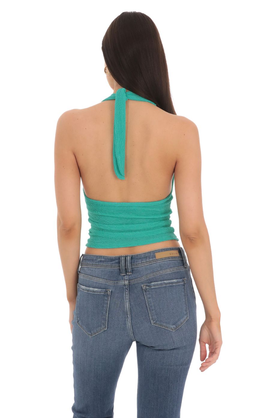 Picture Stretch Textured Halter Top in Turqouise. Source: https://media-img.lucyinthesky.com/data/Mar24/850xAUTO/28c72e11-4cbe-4bff-a355-5d2325924a8d.jpg
