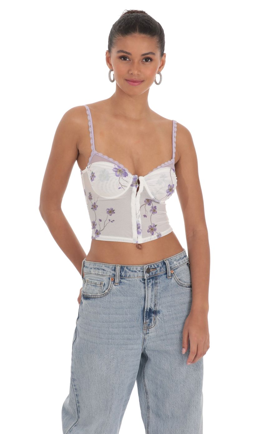 Picture Floral Mesh Top in White. Source: https://media-img.lucyinthesky.com/data/Mar24/850xAUTO/29679a4f-33b7-4e49-a28e-8c959342ba8f.jpg