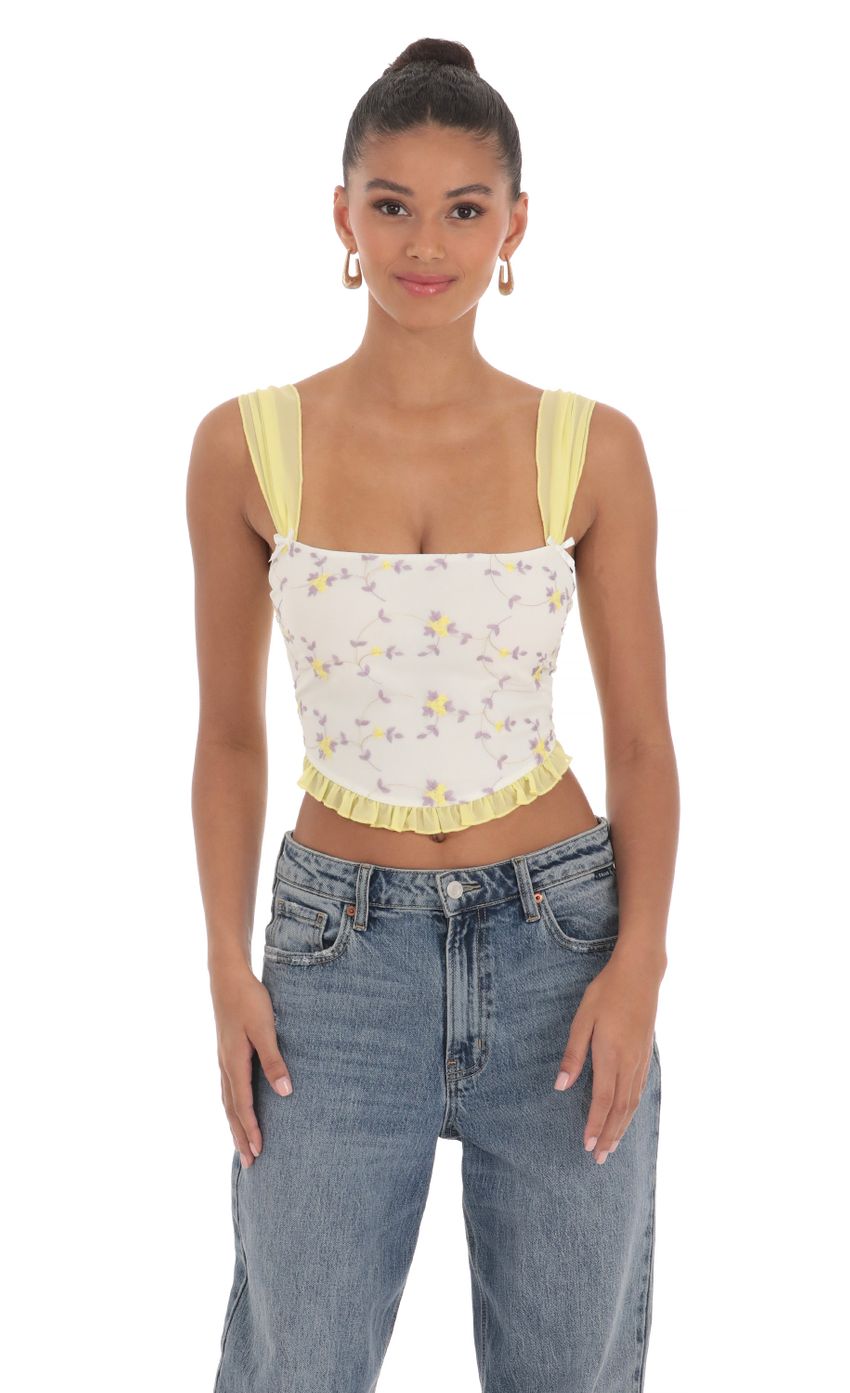 Picture Floral Back Tie Top in White. Source: https://media-img.lucyinthesky.com/data/Mar24/850xAUTO/29d93b8f-c907-4028-9de6-59b0835f3364.jpg