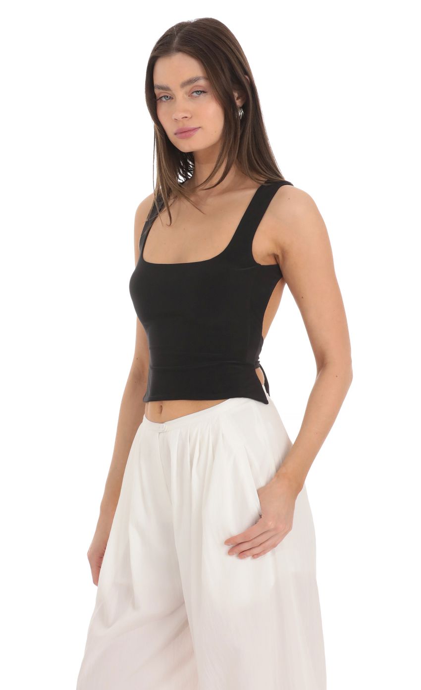 Picture Scoop Neck Open Back Top in Black. Source: https://media-img.lucyinthesky.com/data/Mar24/850xAUTO/29e01784-6845-4d8f-b9cf-5d8d31b74944.jpg