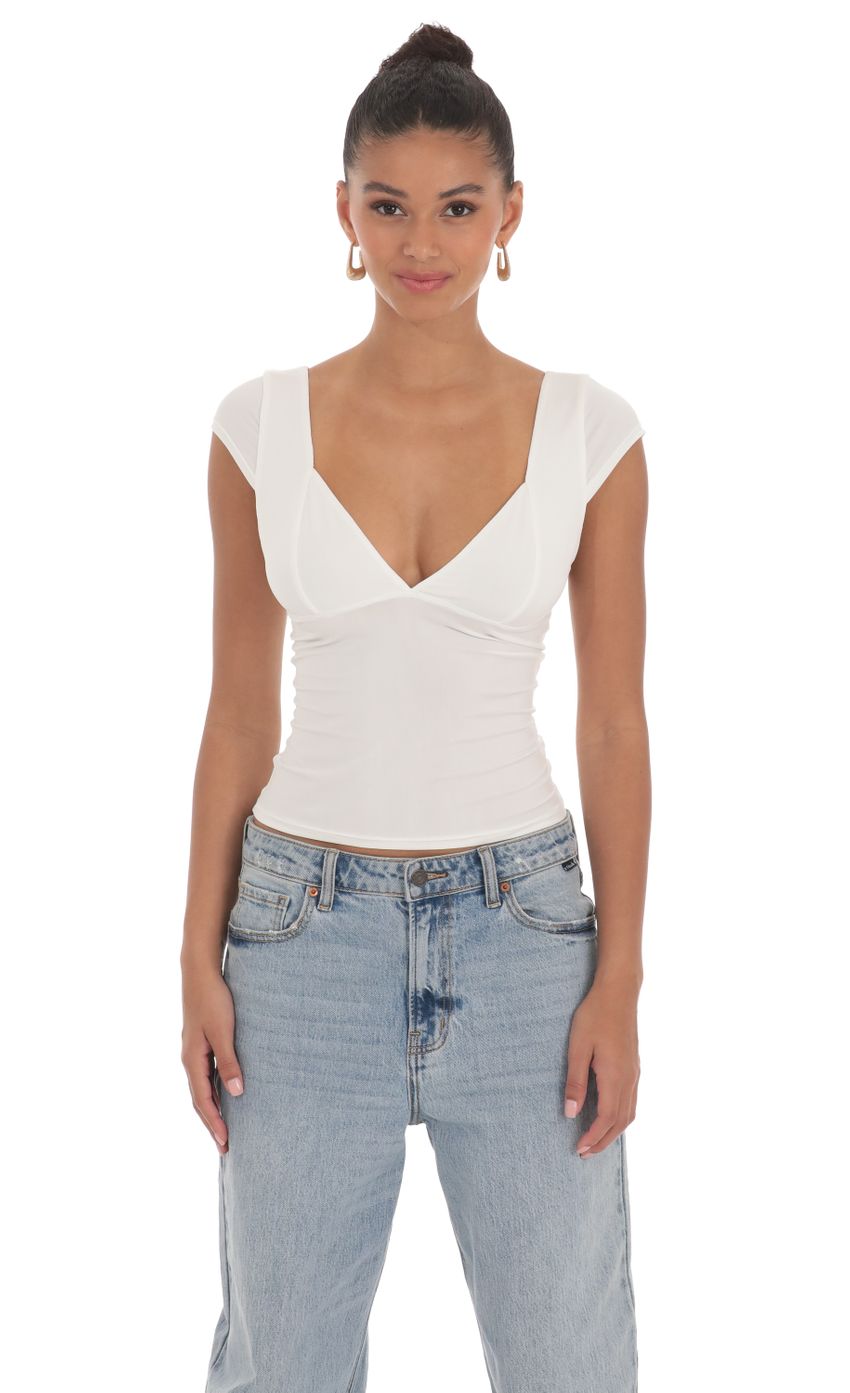 Picture Short Sleeve V-Neck Top in White. Source: https://media-img.lucyinthesky.com/data/Mar24/850xAUTO/29f80c3a-0cea-4717-a377-7bf5ce154832.jpg