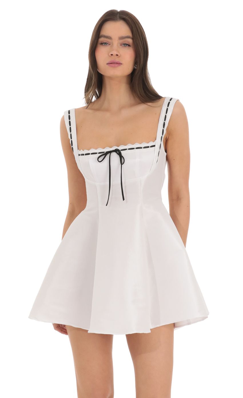 Picture Lace Trim Fit and Flare Dress in White. Source: https://media-img.lucyinthesky.com/data/Mar24/850xAUTO/2b08127b-ffb4-45b5-9bbf-80999c7af1f7.jpg