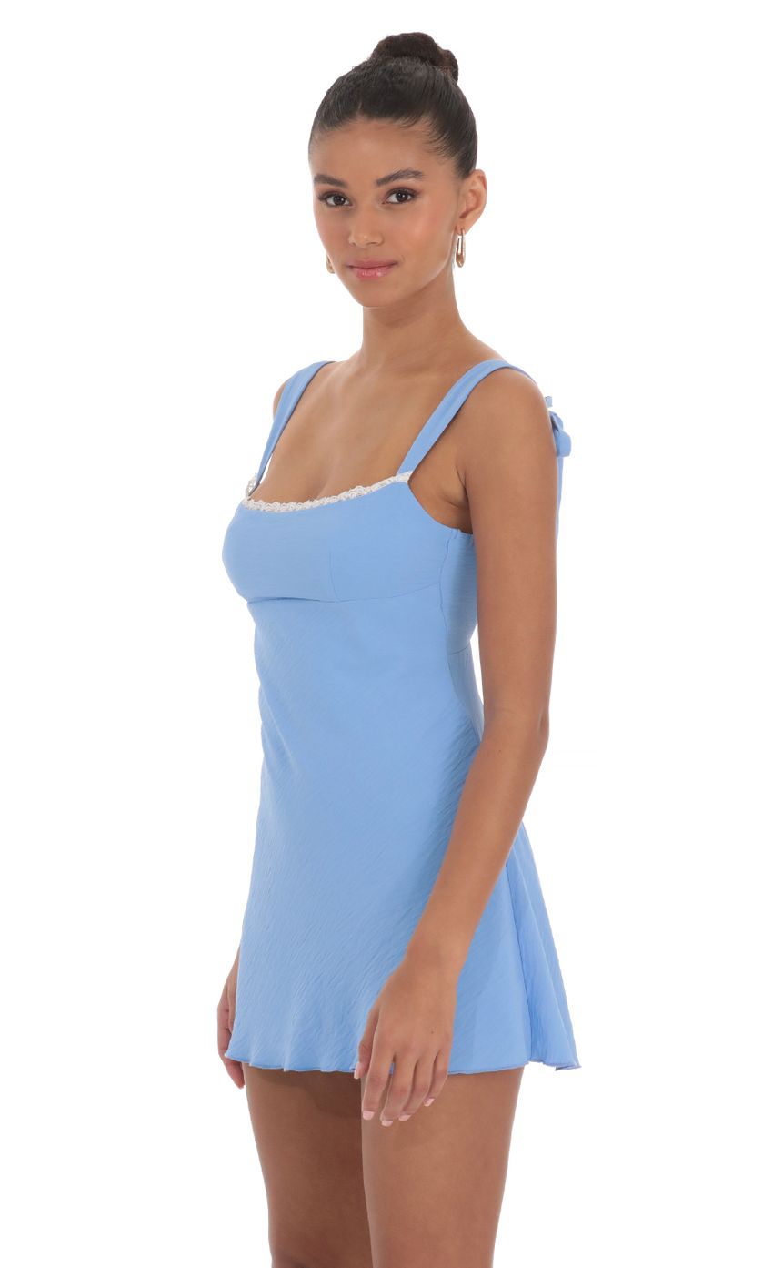 Picture Lace Trim Open Back Dress in Blue. Source: https://media-img.lucyinthesky.com/data/Mar24/850xAUTO/2b3b2abd-34fc-4392-b374-e3a01ea5eecd.jpg