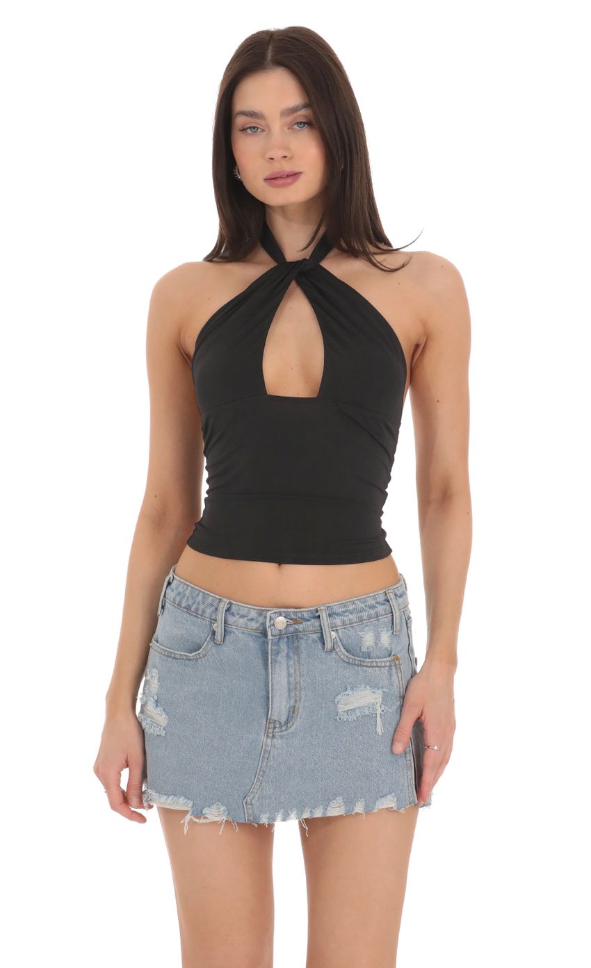 Picture Cross Neck Halter Top in Black. Source: https://media-img.lucyinthesky.com/data/Mar24/850xAUTO/2da7f504-2c2b-4ae8-be4a-161d01a8c175.jpg