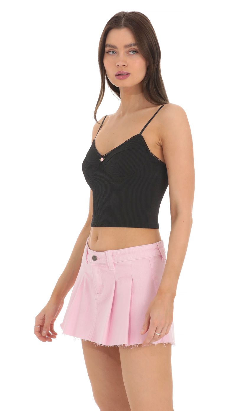 Picture Ribbed Crop Top in Black. Source: https://media-img.lucyinthesky.com/data/Mar24/850xAUTO/301dd038-39da-49cc-8f0d-4a3ed4e2f466.jpg