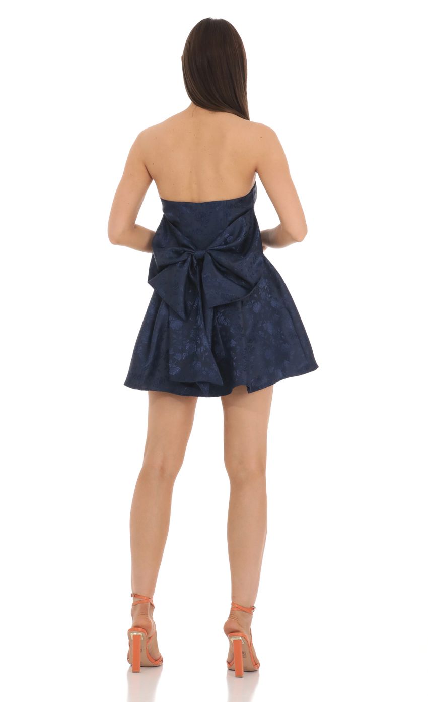 Picture Back Bow Jacquard Corset Dress in Navy. Source: https://media-img.lucyinthesky.com/data/Mar24/850xAUTO/39c7d510-d1ea-4c83-8e82-f28e73c6bc6f.jpg