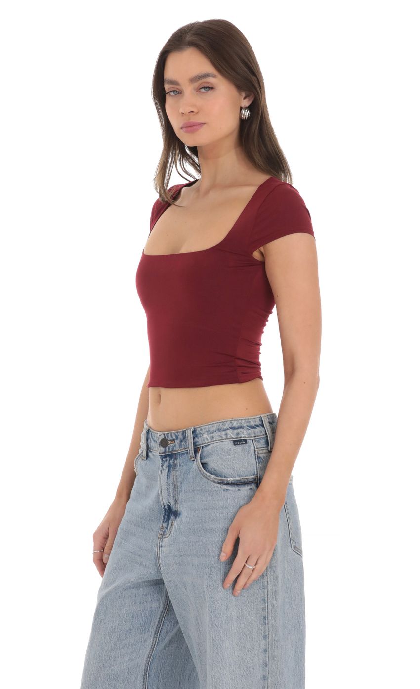 Picture Short Sleeve Crop Top in Maroon. Source: https://media-img.lucyinthesky.com/data/Mar24/850xAUTO/3b236f00-c980-4a02-b66a-8953075ca749.jpg