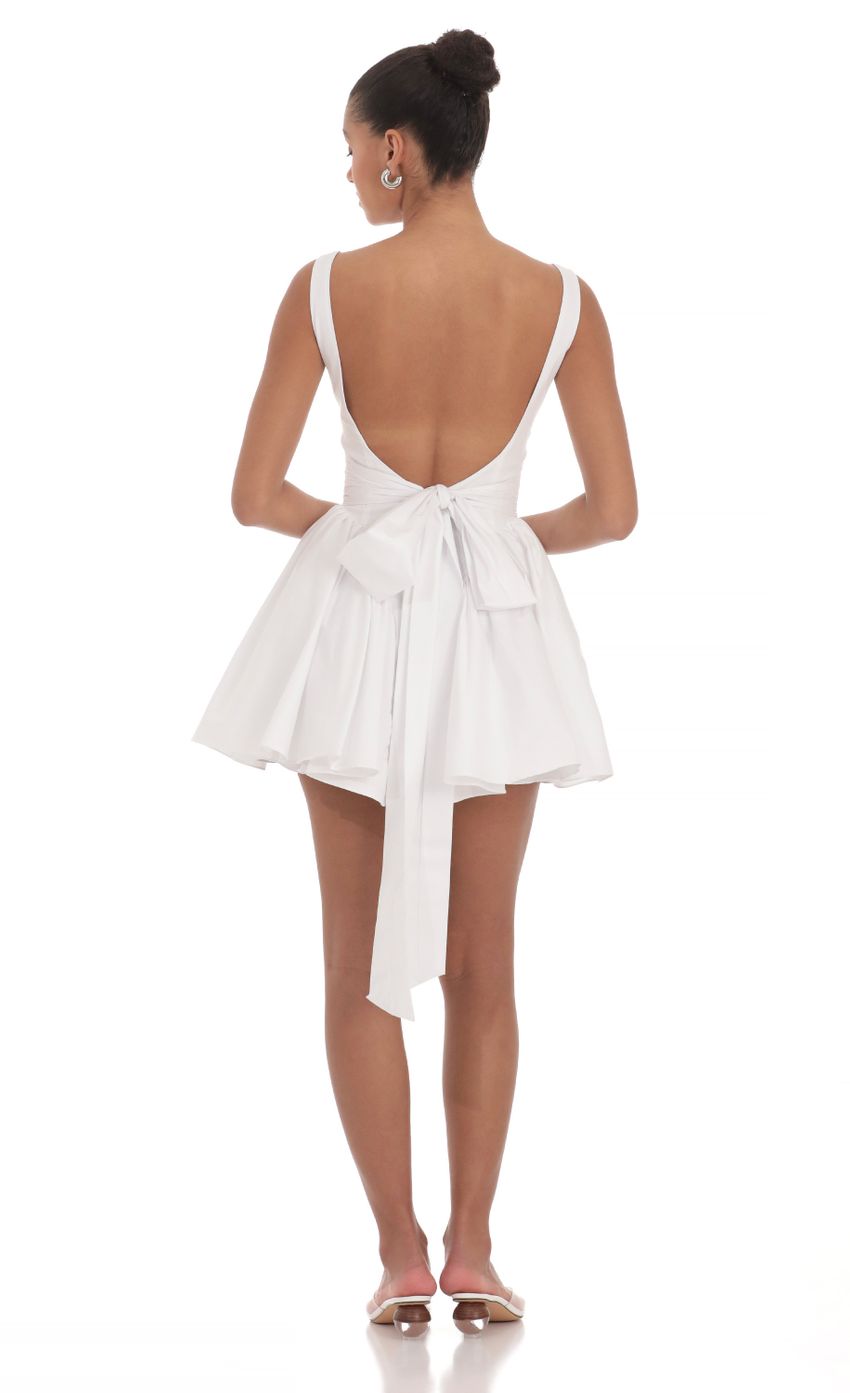 Picture Open Back Flare Dress in White. Source: https://media-img.lucyinthesky.com/data/Mar24/850xAUTO/3c22bb97-3567-4ee2-ab31-dc2921080687.jpg