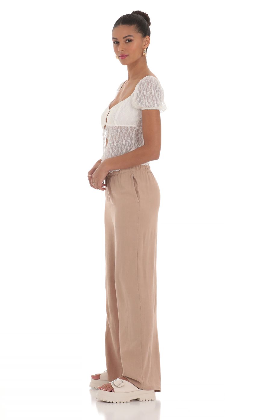 Picture Relaxed Wide Leg Pants in Tan. Source: https://media-img.lucyinthesky.com/data/Mar24/850xAUTO/3cb25304-7f5f-4fb4-a9cf-dde006cf23d8.jpg