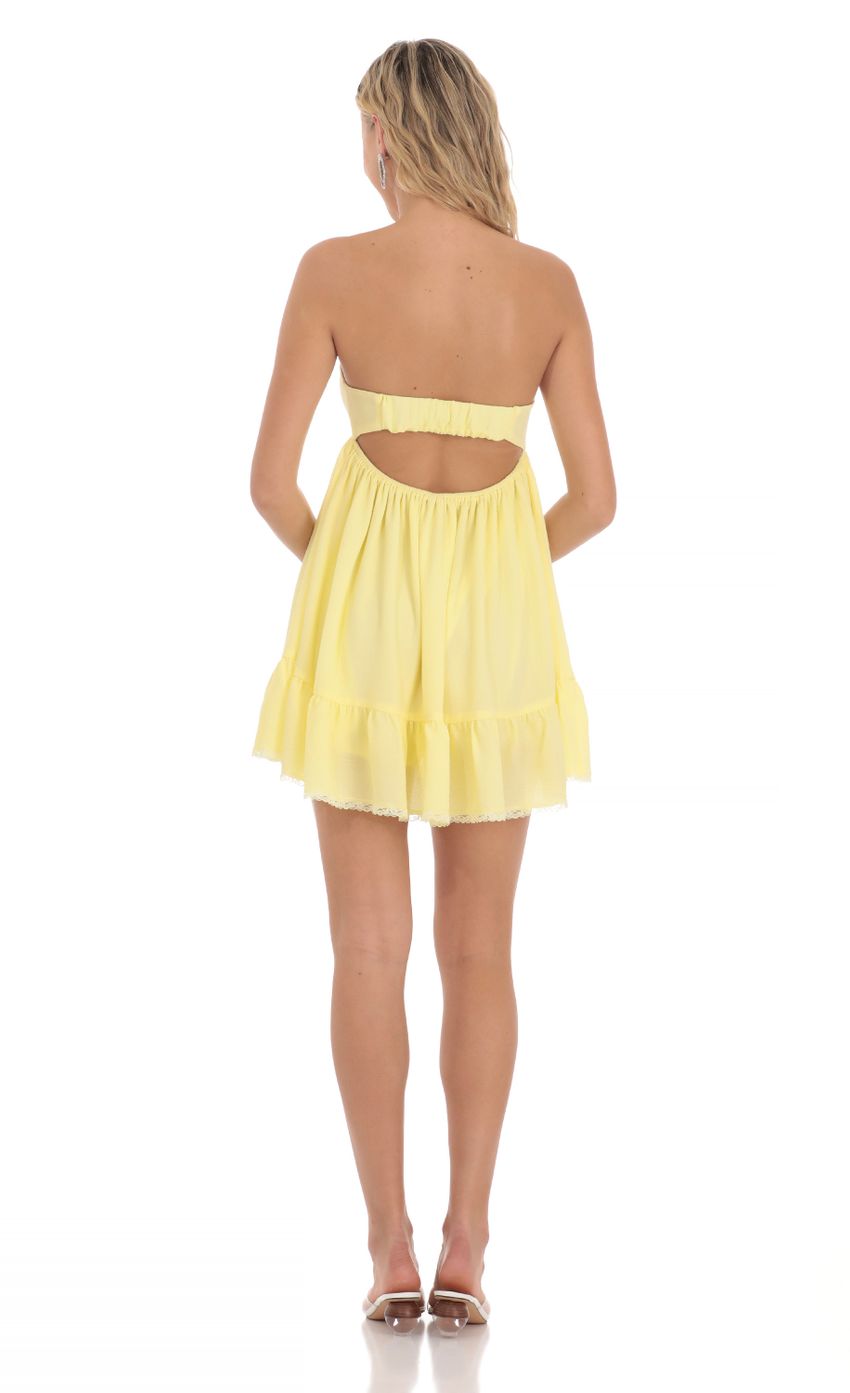Picture Front Tie Babydoll Dress in Yellow. Source: https://media-img.lucyinthesky.com/data/Mar24/850xAUTO/3d774dd0-ab46-4f42-af5f-a41c425b5d67.jpg