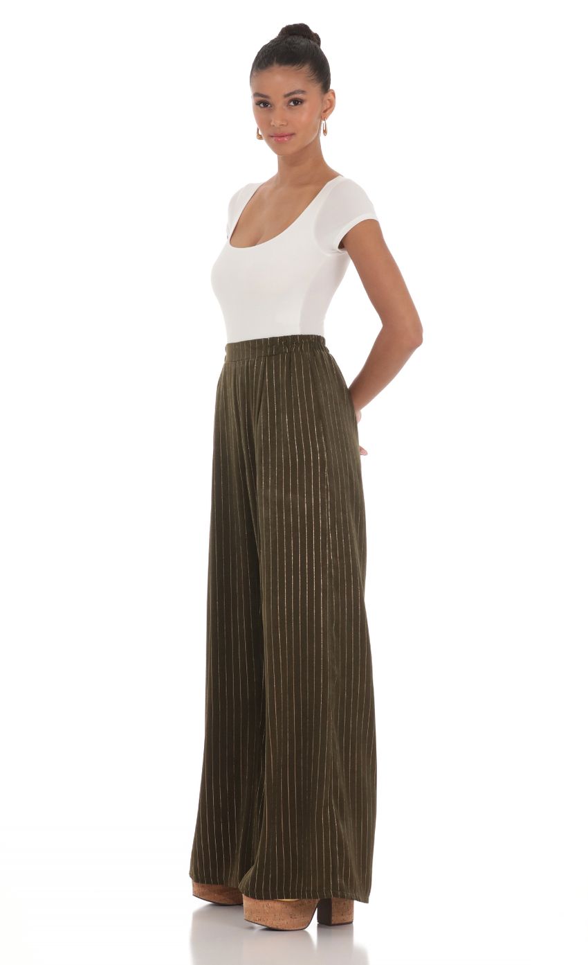Picture Wide Shimmer Striped Pants in Dark Olive. Source: https://media-img.lucyinthesky.com/data/Mar24/850xAUTO/405a42d1-596e-432e-beee-8324cdc629b5.jpg