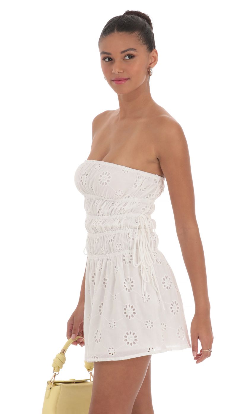 Picture Strapless Eyelet Dress in White. Source: https://media-img.lucyinthesky.com/data/Mar24/850xAUTO/482799cd-05ae-4eb2-b854-321b860daf53.jpg