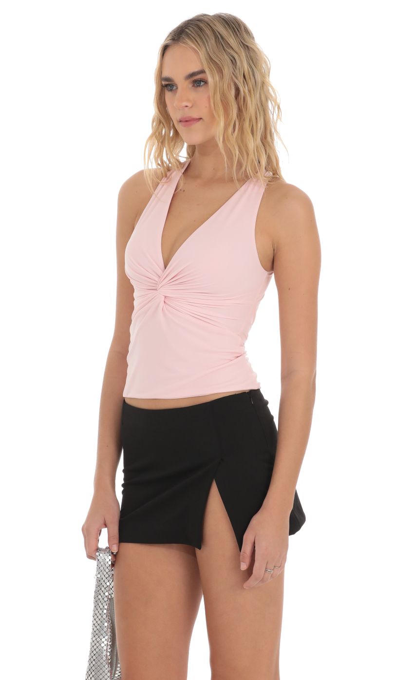Picture Twist Cross Back Top in Pink. Source: https://media-img.lucyinthesky.com/data/Mar24/850xAUTO/49237acb-cbeb-4f08-bba7-d40e82d728f6.jpg