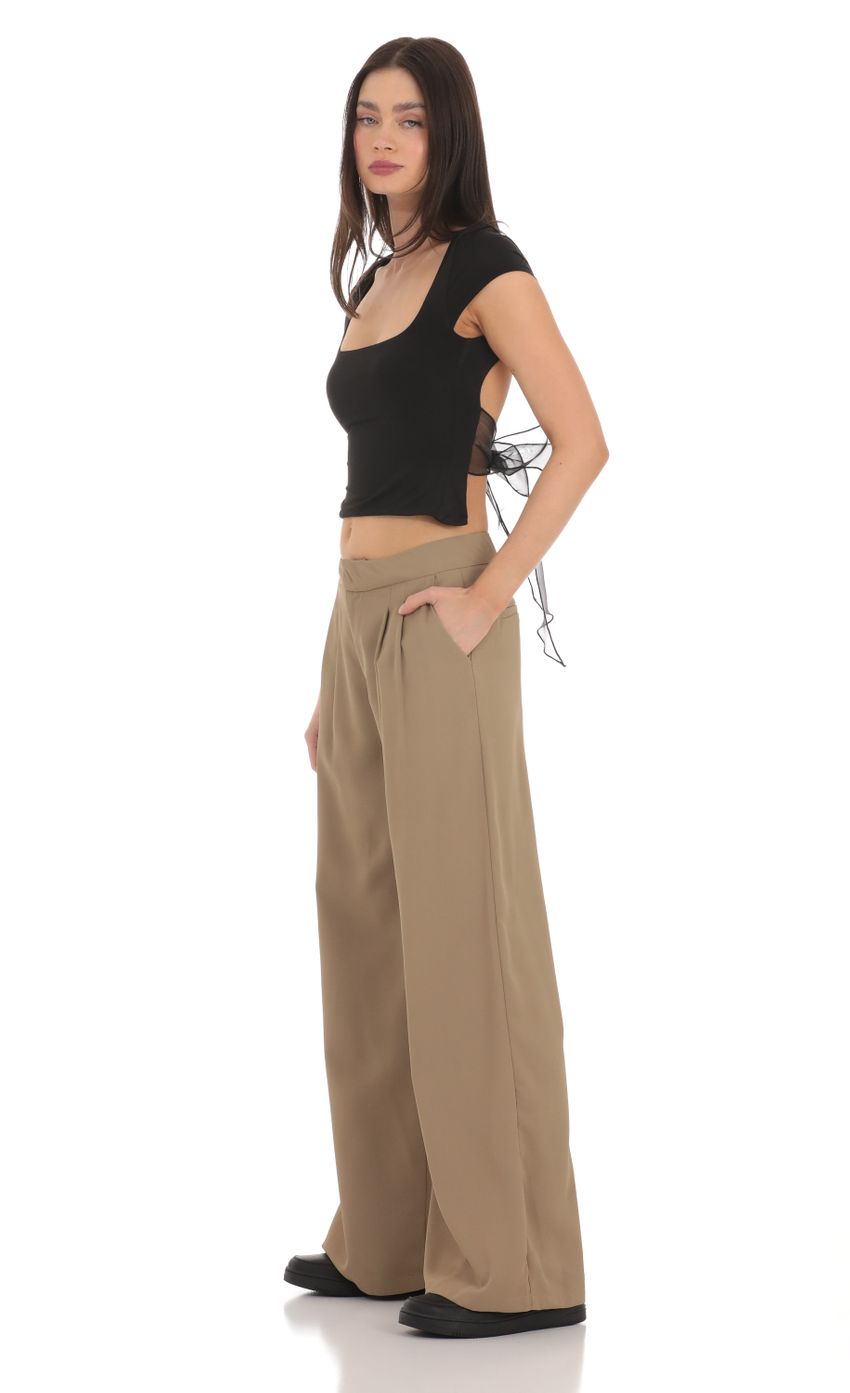 Picture Pleated Wide Leg Trousers in Taupe. Source: https://media-img.lucyinthesky.com/data/Mar24/850xAUTO/4cef9a58-efe3-4160-97bf-570638a8858b.jpg