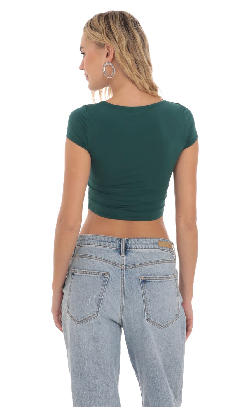 Picture Cowl Neck Top in Green. Source: https://media-img.lucyinthesky.com/data/Mar24/850xAUTO/557f4979-07f7-4658-8ea1-e412693b0c25.jpg