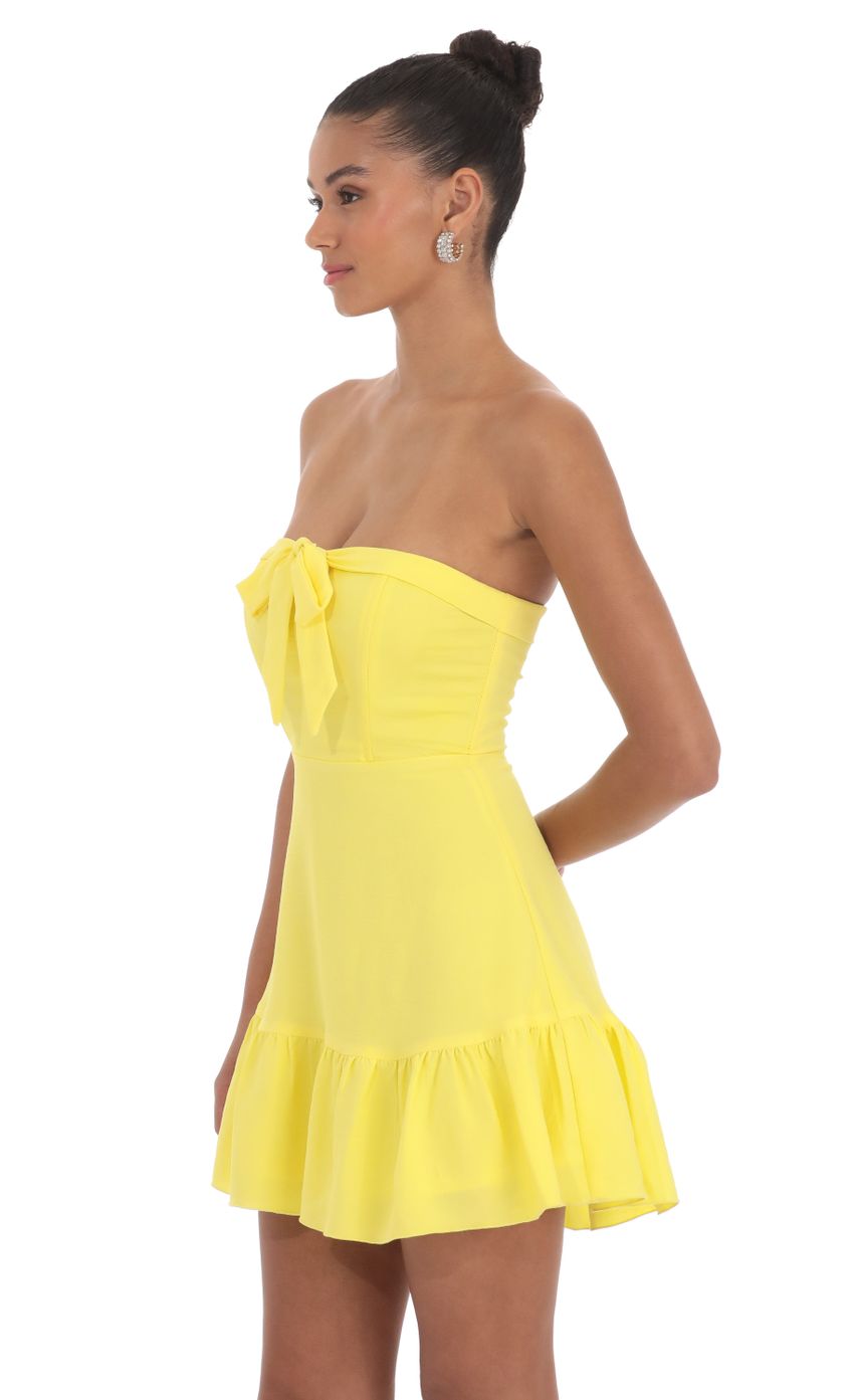 Picture Front Tie Strapless Corset Dress in Yellow. Source: https://media-img.lucyinthesky.com/data/Mar24/850xAUTO/5c5b6385-a4b0-4405-ae6d-d081a4cb5344.jpg