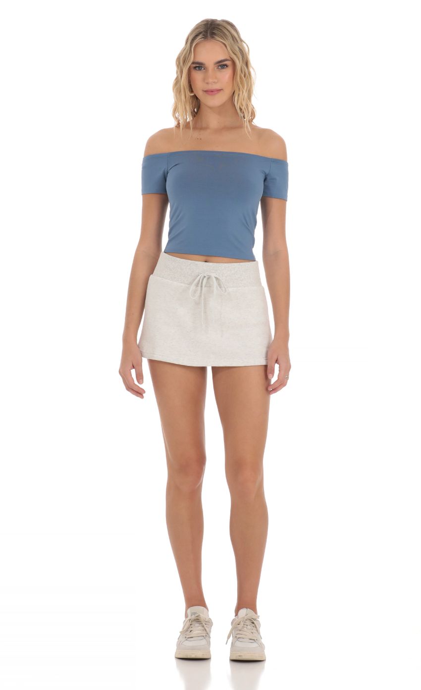 Picture Off Shoulder Top in Blue. Source: https://media-img.lucyinthesky.com/data/Mar24/850xAUTO/5cf14bb8-7c72-4b95-8994-9fa9a05b1c37.jpg