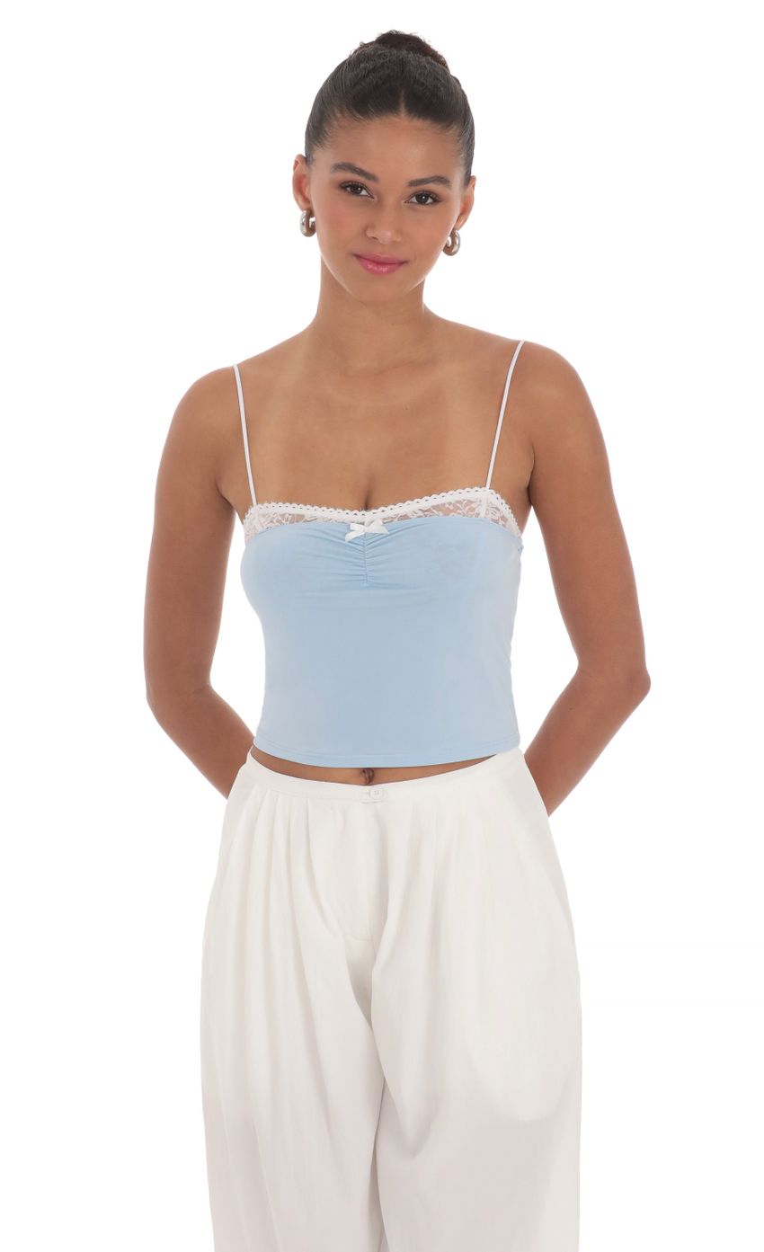 Picture Lace Trim Crop Top in Blue. Source: https://media-img.lucyinthesky.com/data/Mar24/850xAUTO/5ee23a2c-d638-4401-ab4b-3ea1322e30d3.jpg