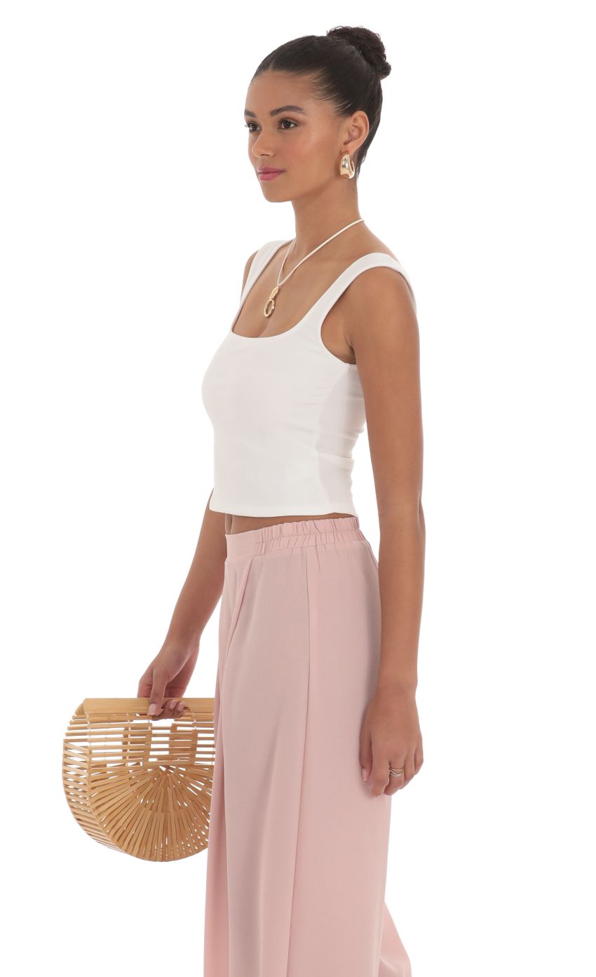 Picture Scoop Tank Top in White. Source: https://media-img.lucyinthesky.com/data/Mar24/850xAUTO/60071452-85e3-4169-bea5-8d833a972323.jpg
