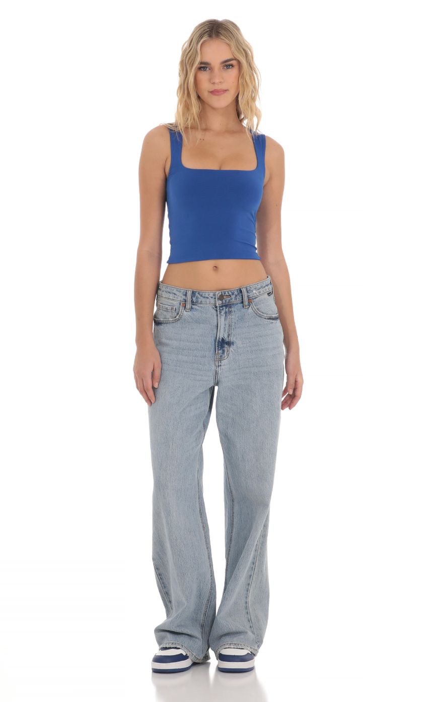 Picture Scoop Neck Tank Top in Blue. Source: https://media-img.lucyinthesky.com/data/Mar24/850xAUTO/6392566d-1100-434a-96fe-61789c794c42.jpg