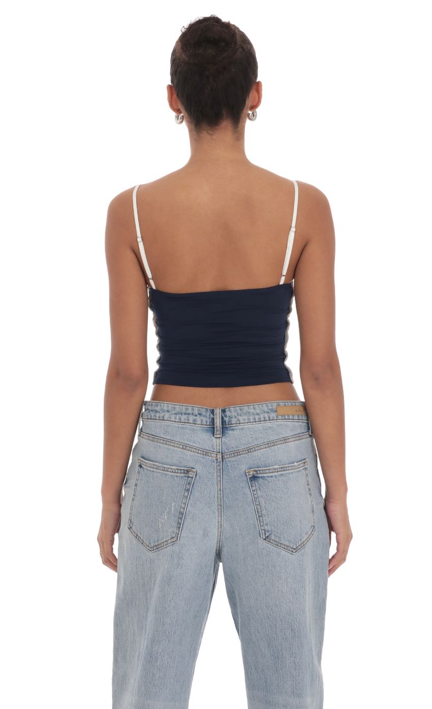 Picture Outline Crop Top in Navy. Source: https://media-img.lucyinthesky.com/data/Mar24/850xAUTO/6a457770-9921-404c-a097-c4b8d8b8a9b2.jpg