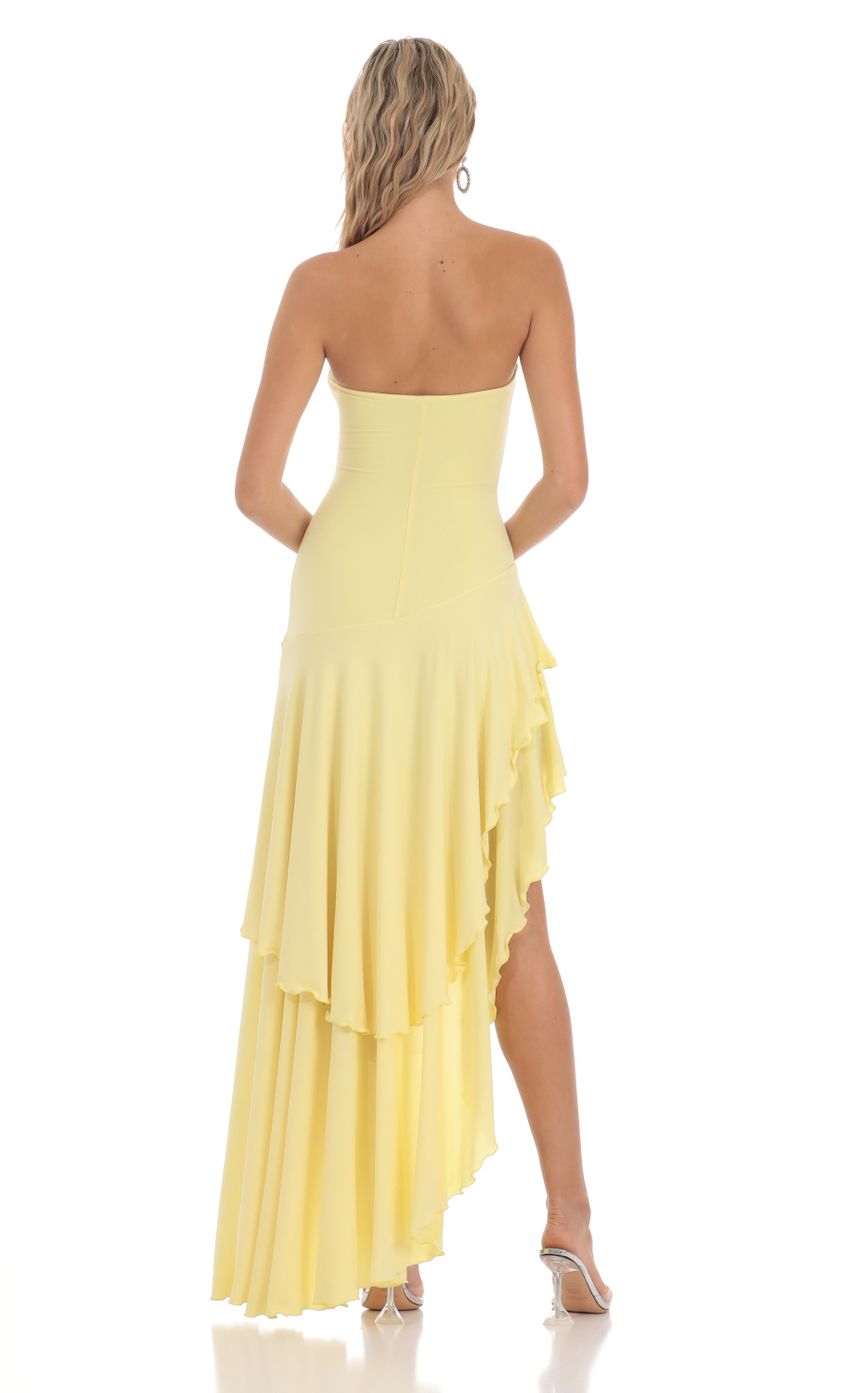 Picture Strapless Ruffle Asymmetrical Maxi Dress in Yellow. Source: https://media-img.lucyinthesky.com/data/Mar24/850xAUTO/6e44baab-a65d-4ad8-a236-3fa0ec34f849.jpg