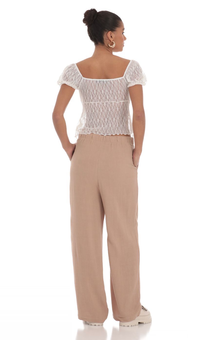 Picture Relaxed Wide Leg Pants in Tan. Source: https://media-img.lucyinthesky.com/data/Mar24/850xAUTO/6ed96c5e-ccef-4c44-9412-3616d9ef3dc2.jpg