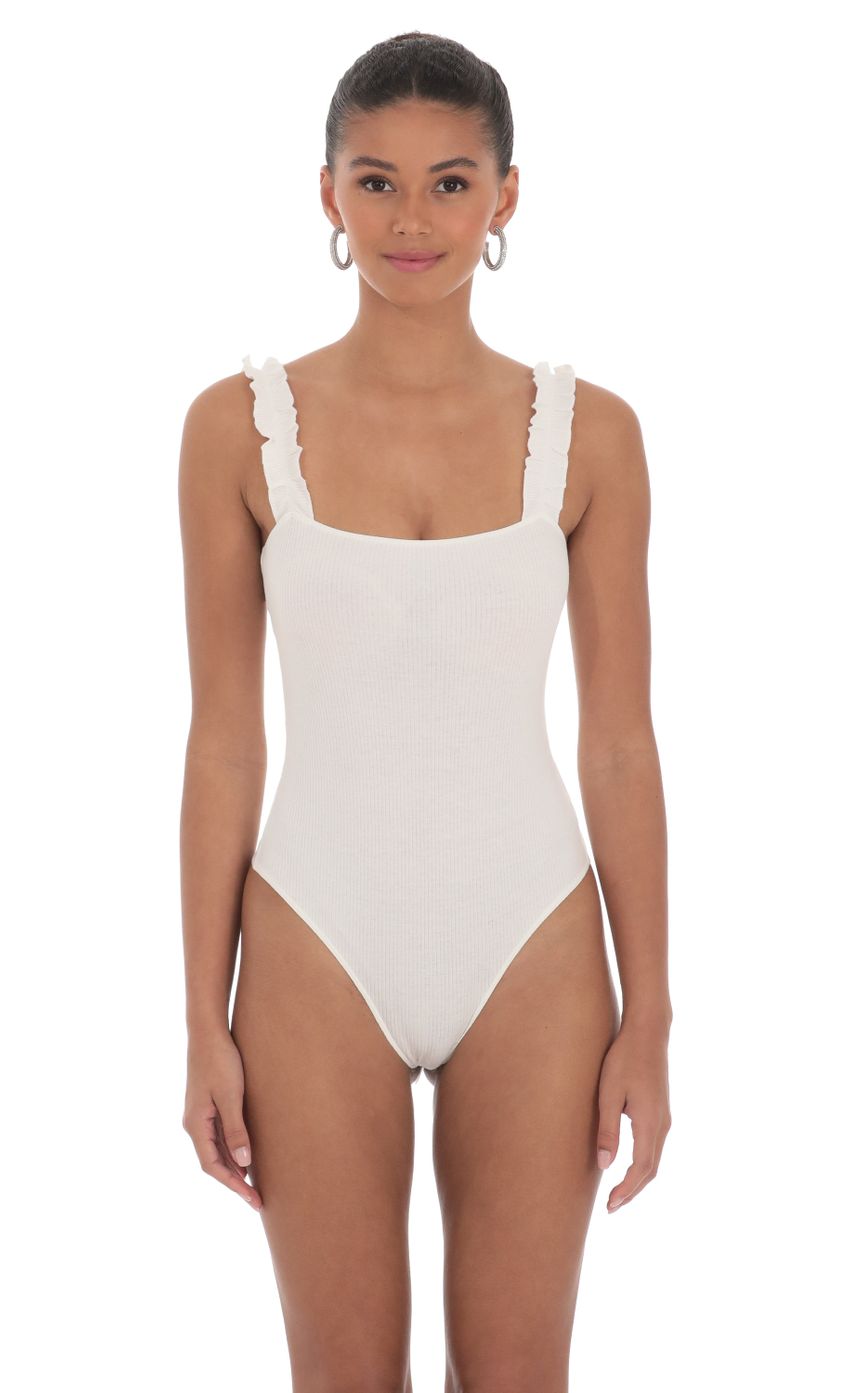 Picture Ribbed Frill Strap Bodysuit in White. Source: https://media-img.lucyinthesky.com/data/Mar24/850xAUTO/709894e2-2d51-4659-95f9-21fc0821129f.jpg