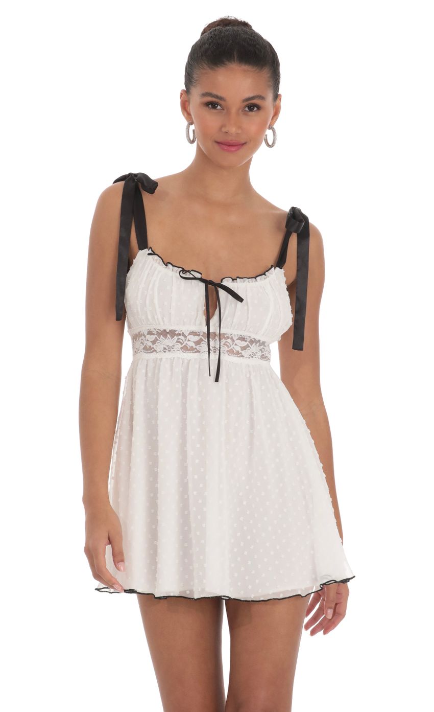Picture Dotted Lace Babydoll Dress in White. Source: https://media-img.lucyinthesky.com/data/Mar24/850xAUTO/70cb940e-6ed8-49fd-b109-baca8de78069.jpg
