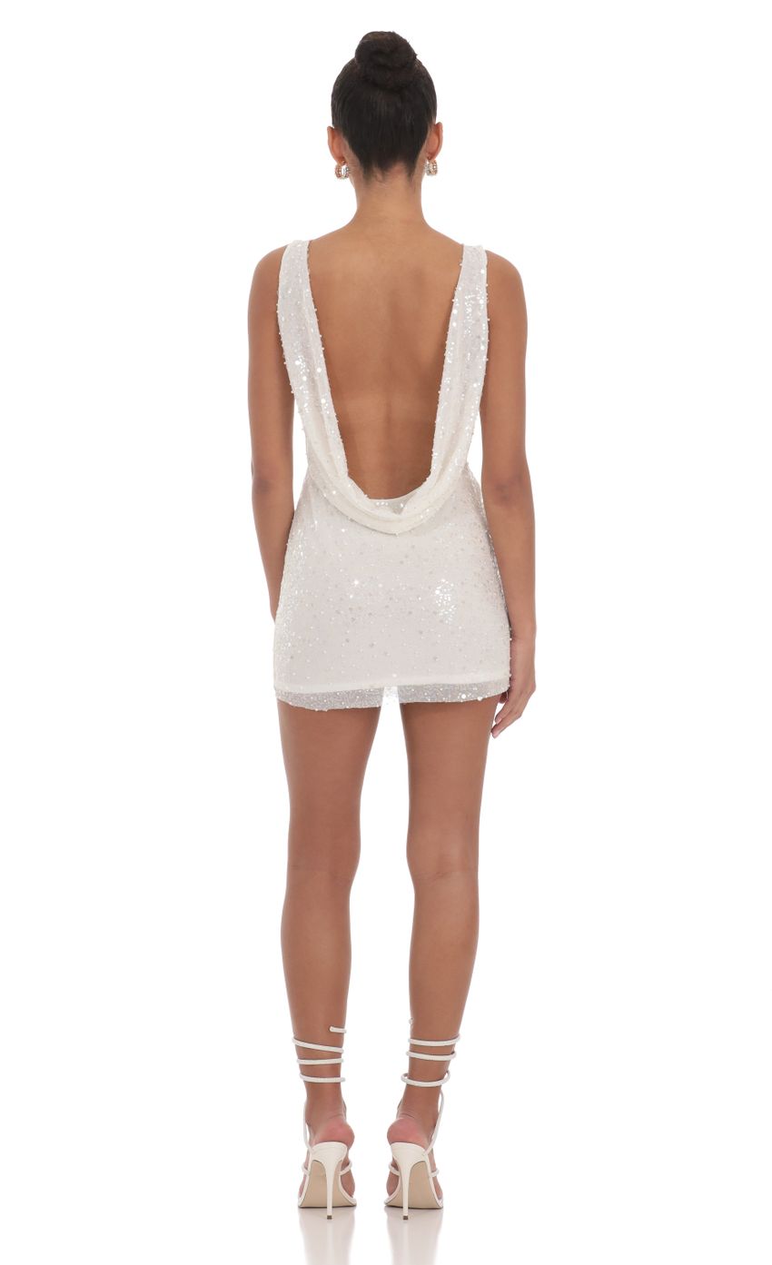 Picture Sequin Draped Open Back Dress in White. Source: https://media-img.lucyinthesky.com/data/Mar24/850xAUTO/72ea8f11-c800-4265-870c-839755111c03.jpg