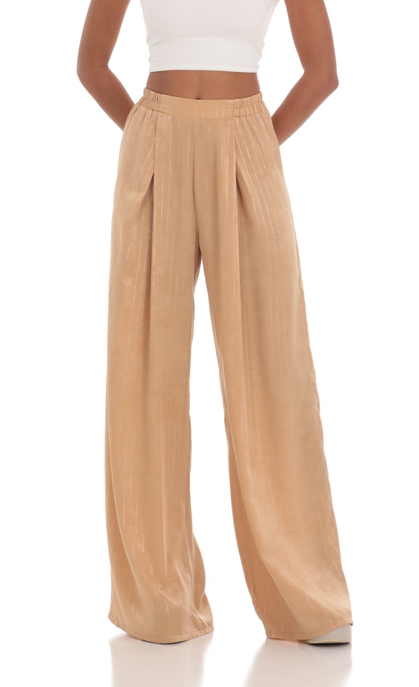 Picture Wide Shimmer Striped Pants in Light Brown. Source: https://media-img.lucyinthesky.com/data/Mar24/850xAUTO/74174a81-1f98-449c-94db-3e21979ed916.jpg