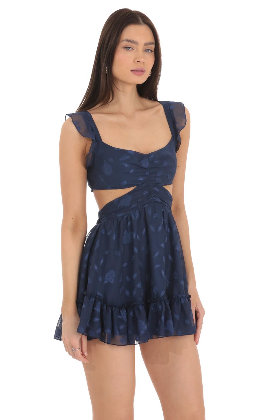 Picture Floral Ruffle Cutout Dress in Navy. Source: https://media-img.lucyinthesky.com/data/Mar24/850xAUTO/7472796e-776d-4711-b7db-eea48f8c1365.jpg