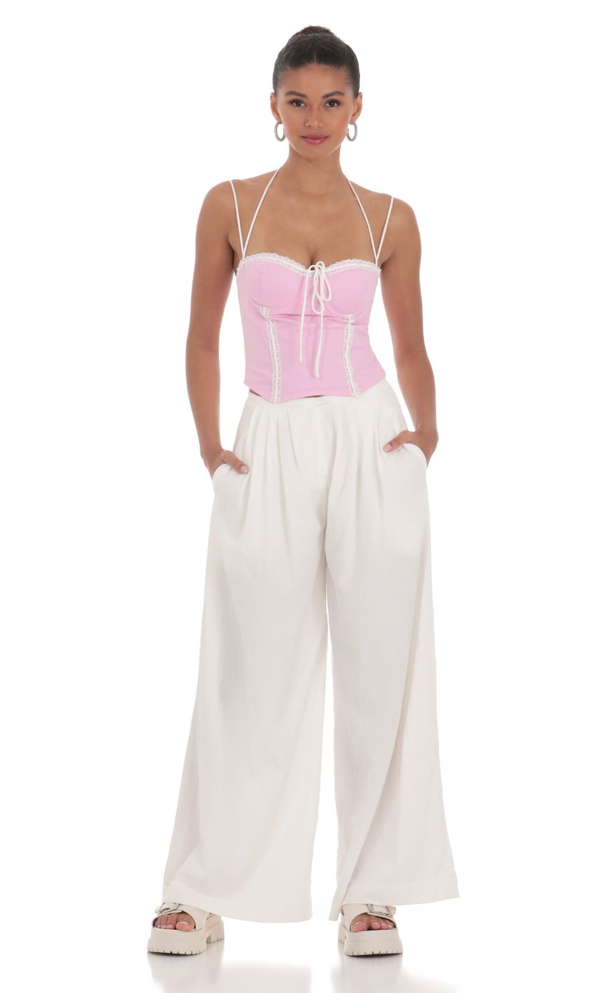 Picture Lace Halter Top in Pink. Source: https://media-img.lucyinthesky.com/data/Mar24/850xAUTO/75308143-162a-460e-ae63-493ed4b5b9eb.jpg